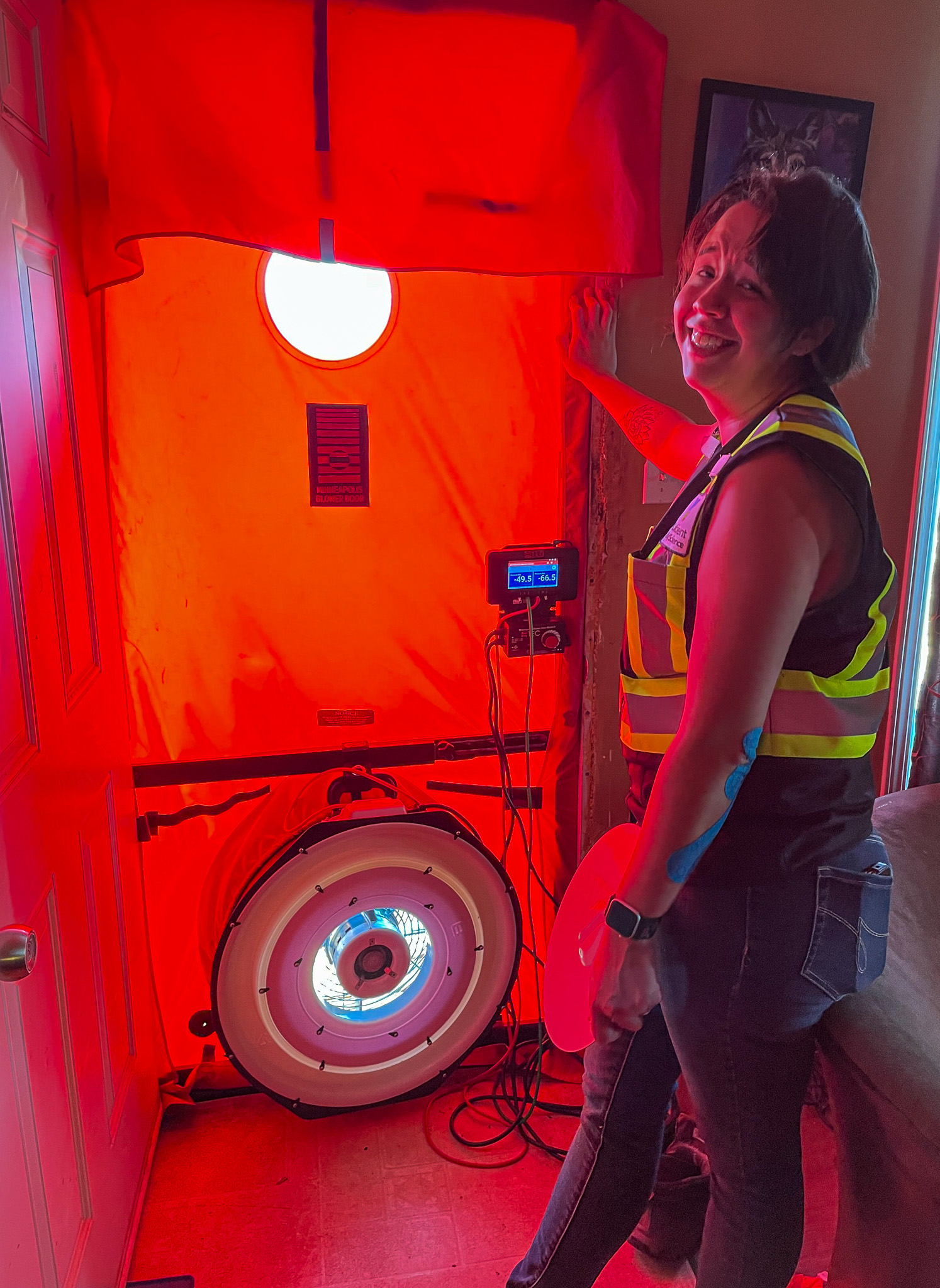 Energy Advisor, Tara Lindenberger performs a blower door test in a home in West Moberly First Nations, Northern British Columbia. (Submitted photo)