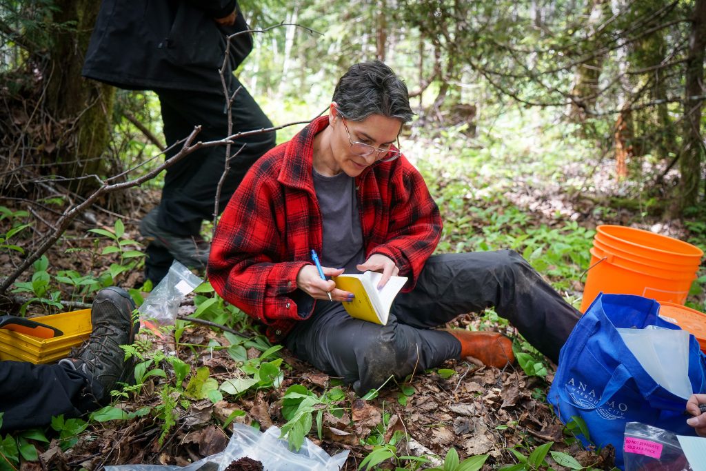 Michelle Connolly, Director of the Climate Resilience program, at work doing carbon sampling in the Great Bear Rainforest.