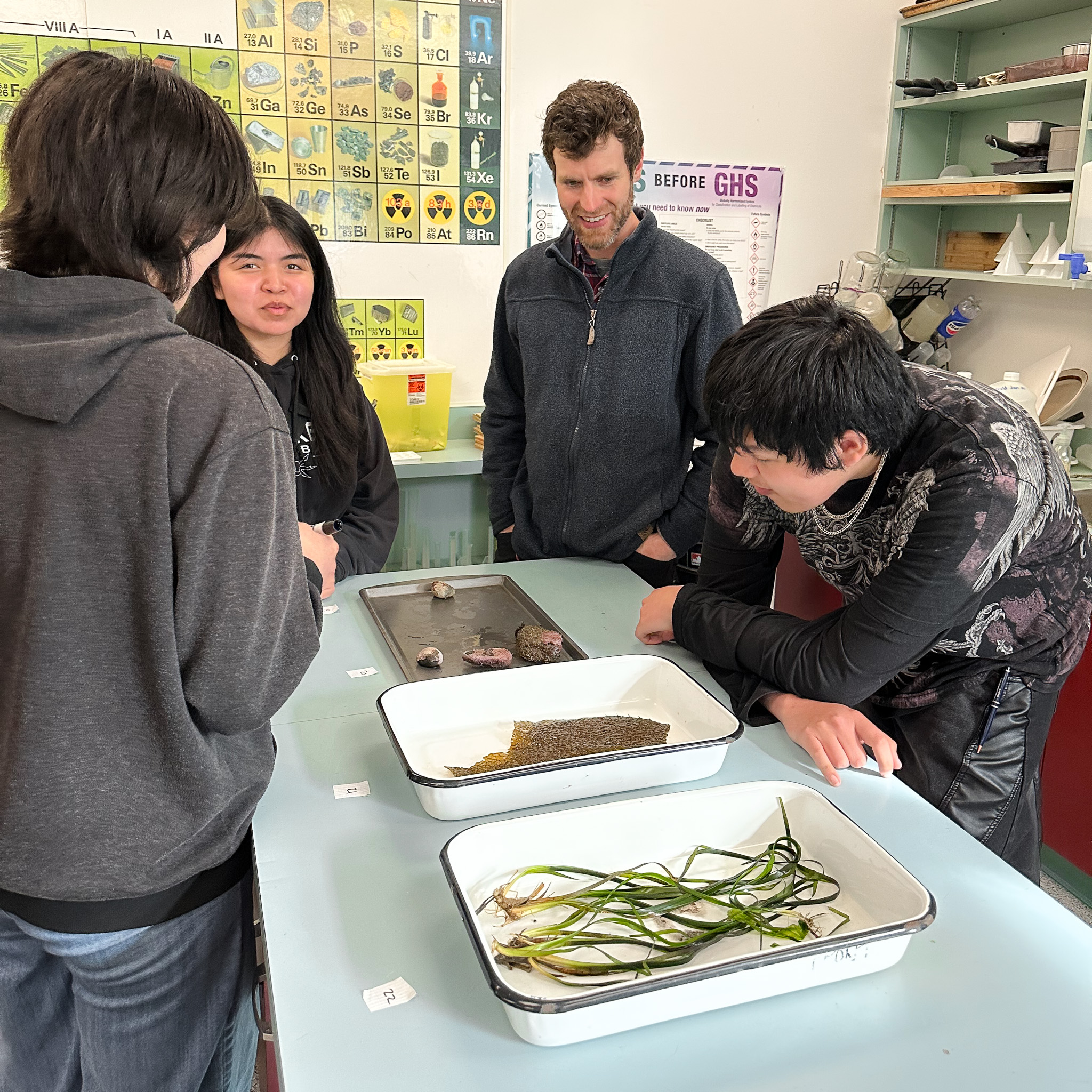 Connor Speer, Project Manager of Coastal Food Systems with Ecotrust Canada, takes part in the new lesson on seaweed at the high school.
