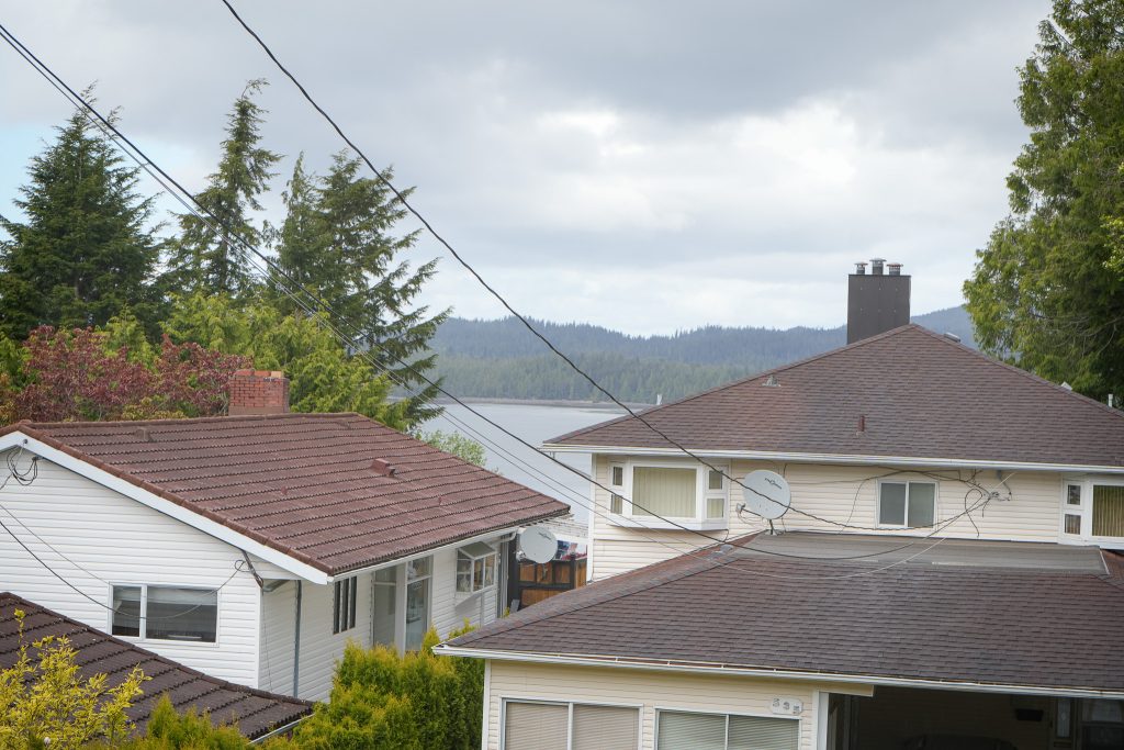 Homes in Prince Rupert, BC, with view of the ocean.